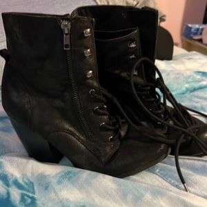 Lace up black boots with heals